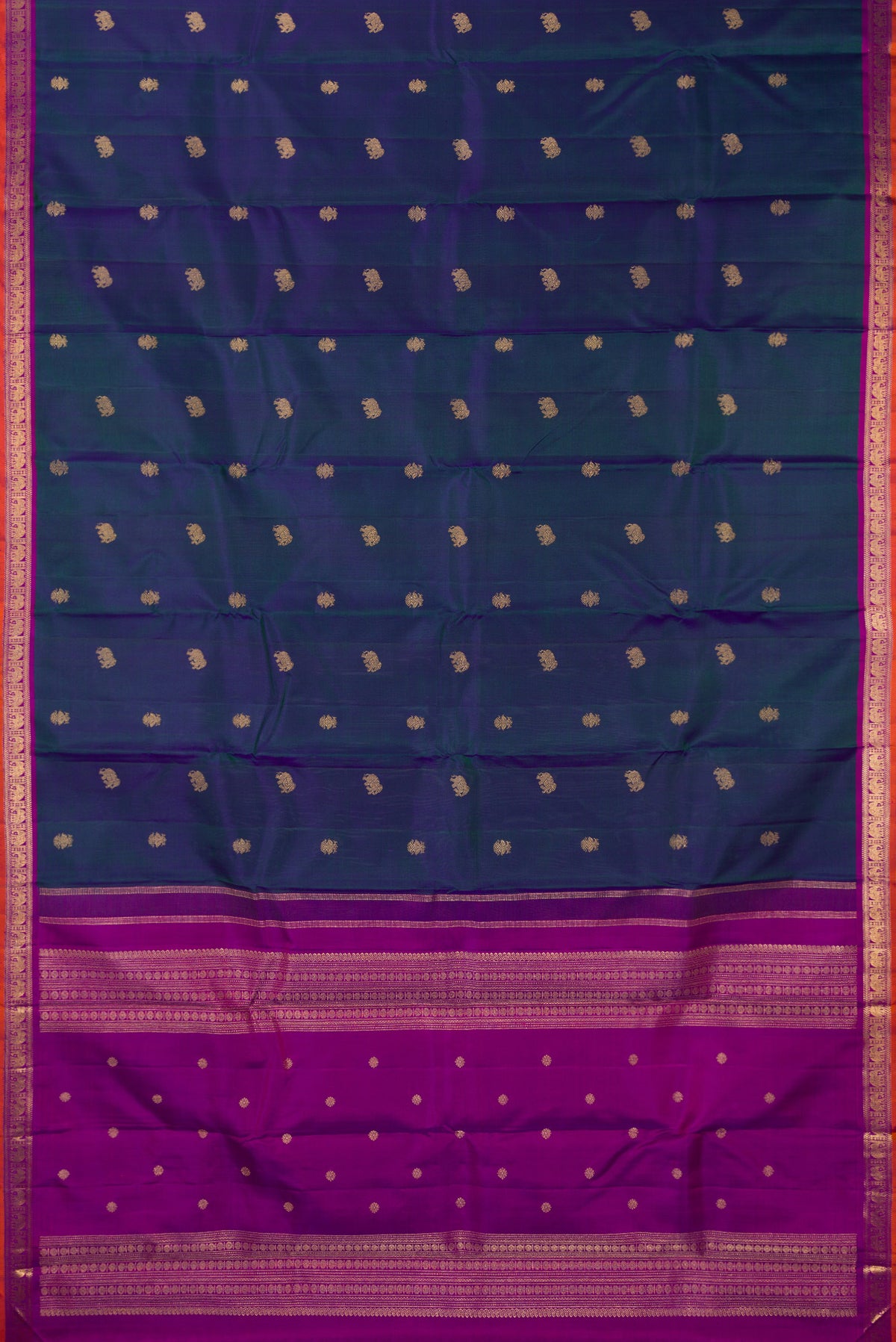 Flat view of Pure Silk Pure Zari Peacock Blue Dual Tone Kanchipuram Saree with Zari Butta on the body and Zari Border. 