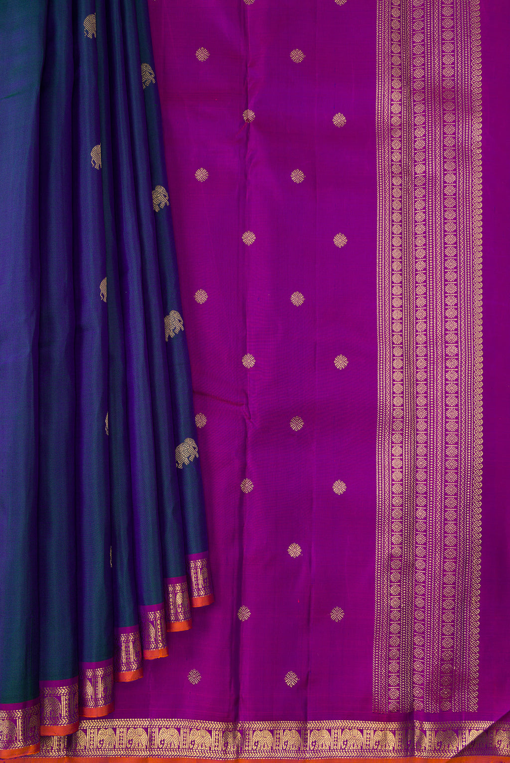 Pleats and pallu of Pure Silk Pure Zari Peacock Blue Dual Tone Kanchipuram Saree with Zari Butta on the body and Zari Border. 