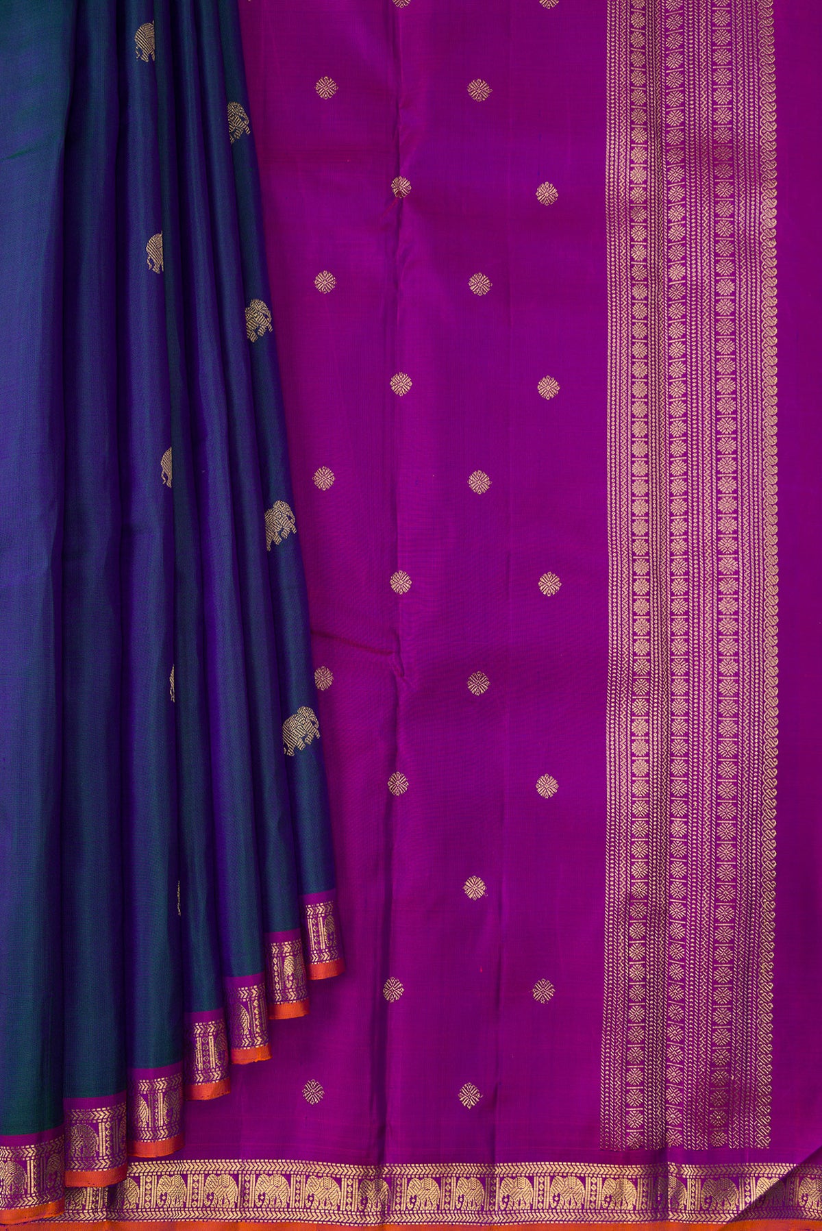 Pleats and pallu of Pure Silk Pure Zari Peacock Blue Dual Tone Kanchipuram Saree with Zari Butta on the body and Zari Border. 