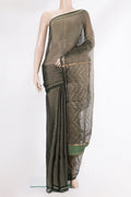 Pure Silk Green Dual Tone Tussar Saree with Stripes on the body and Sequin Border.  displayed on a mannequin