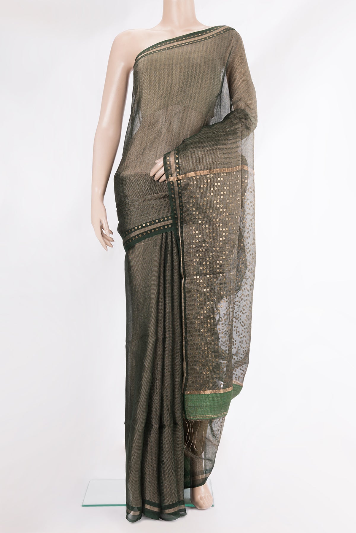 Pure Silk Green Dual Tone Tussar Saree with Stripes on the body and Sequin Border.  displayed on a mannequin
