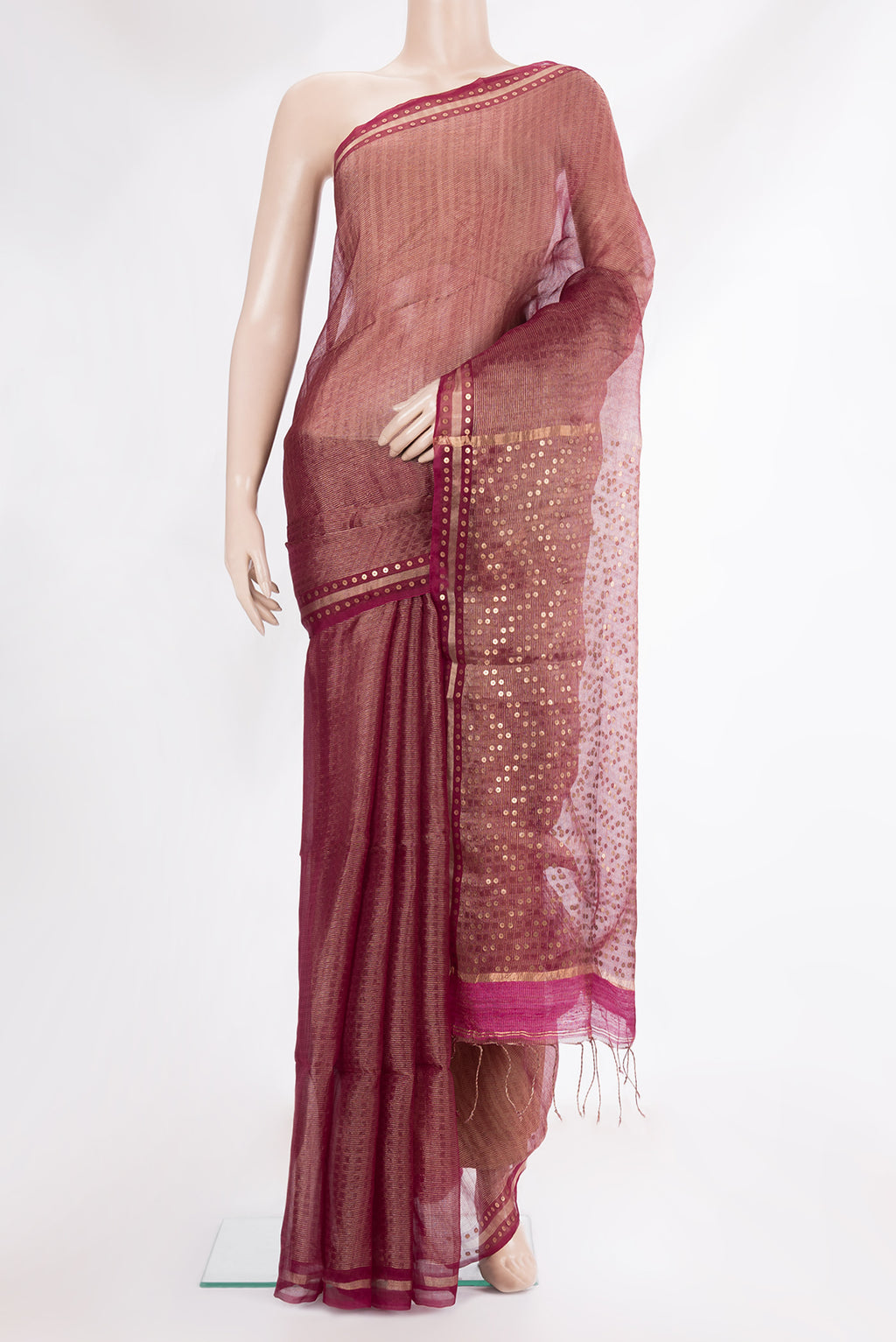 Pure Silk Magenta Dual Tone Tussar Saree with Stripes on the body and Sequin Border.  displayed on a mannequin