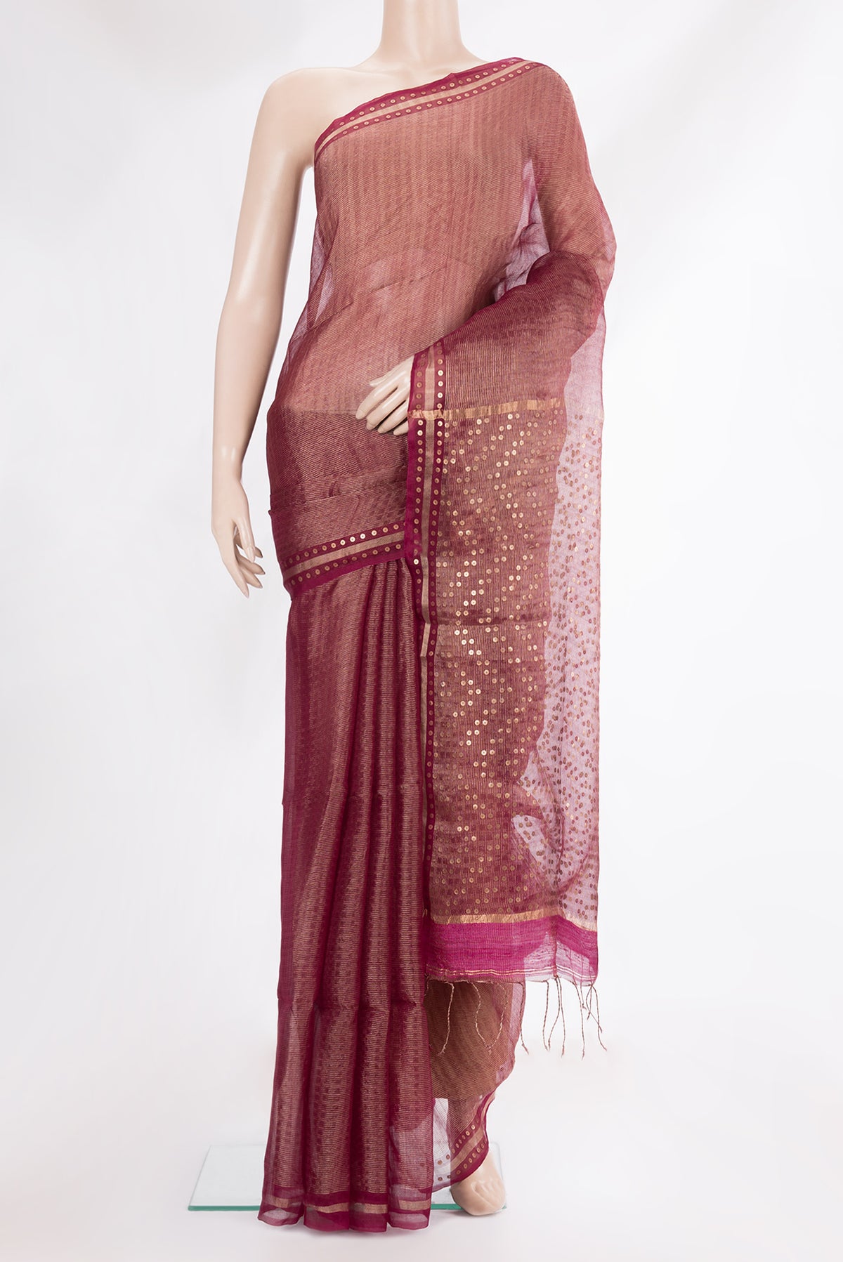 Pure Silk Magenta Dual Tone Tussar Saree with Stripes on the body and Sequin Border.  displayed on a mannequin