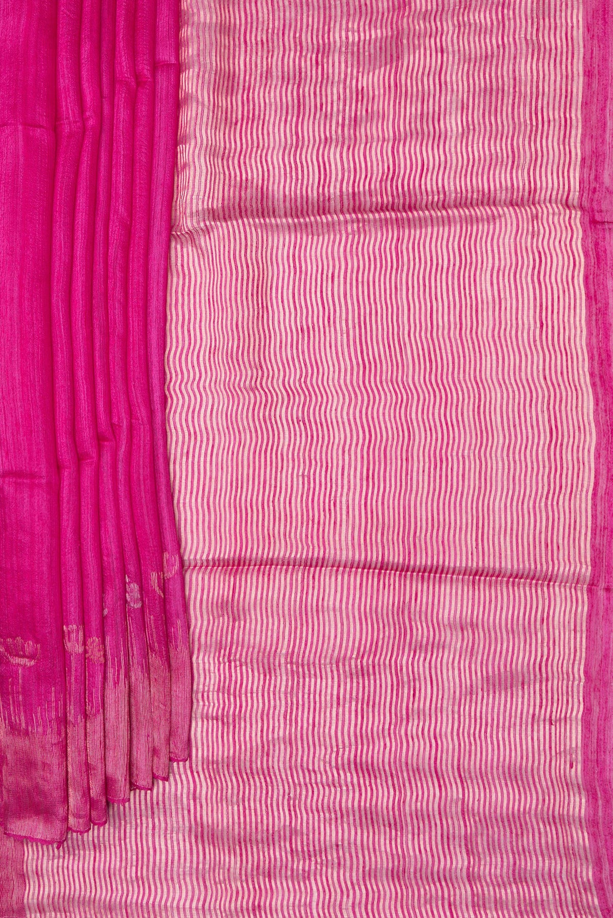Pleats and pallu of Pink Tussar Saree with Plain Body and Fancy Border. 