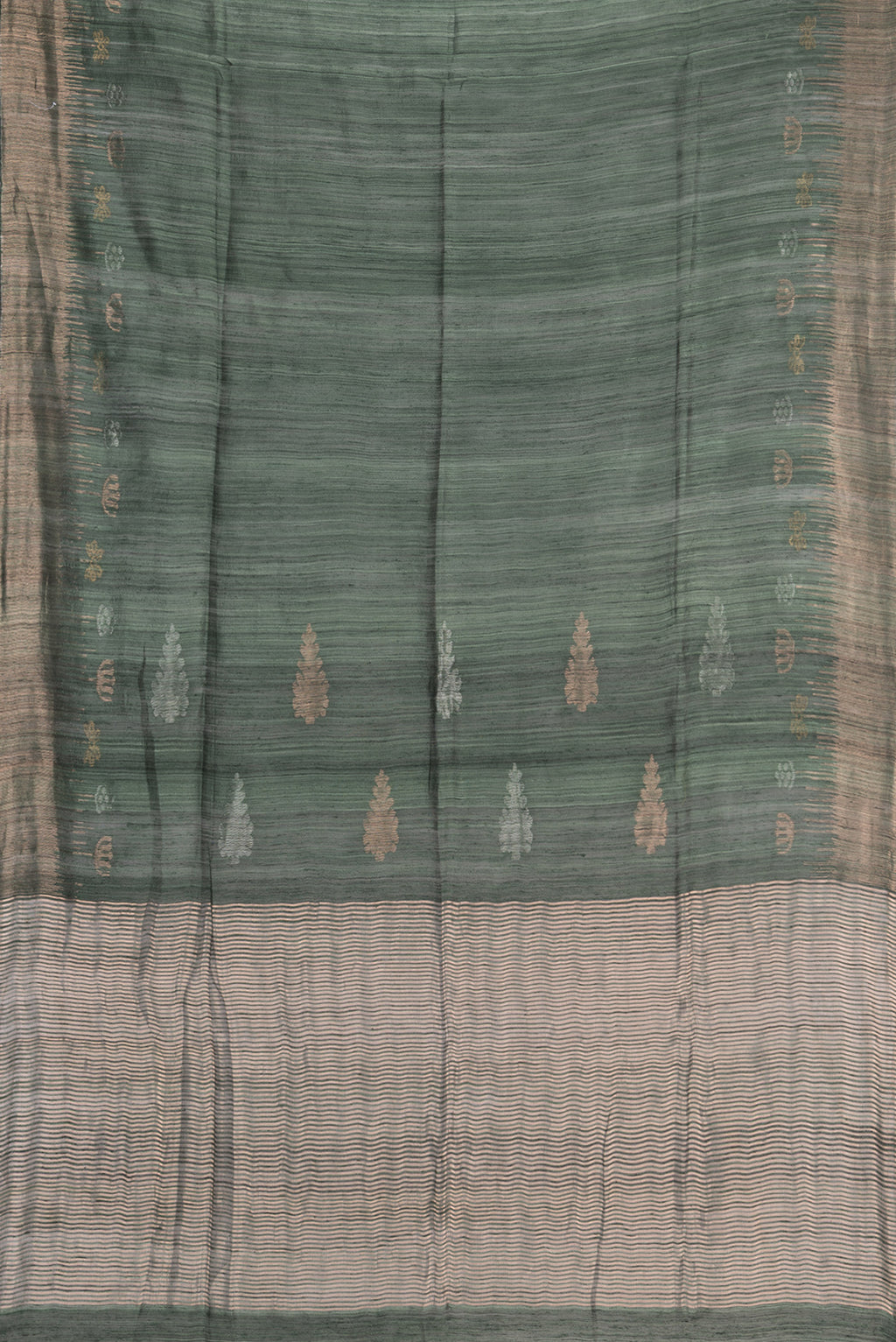 Flat view of Bottle Green Tussar Saree with Zari Butta on the body and Fancy Border. 
