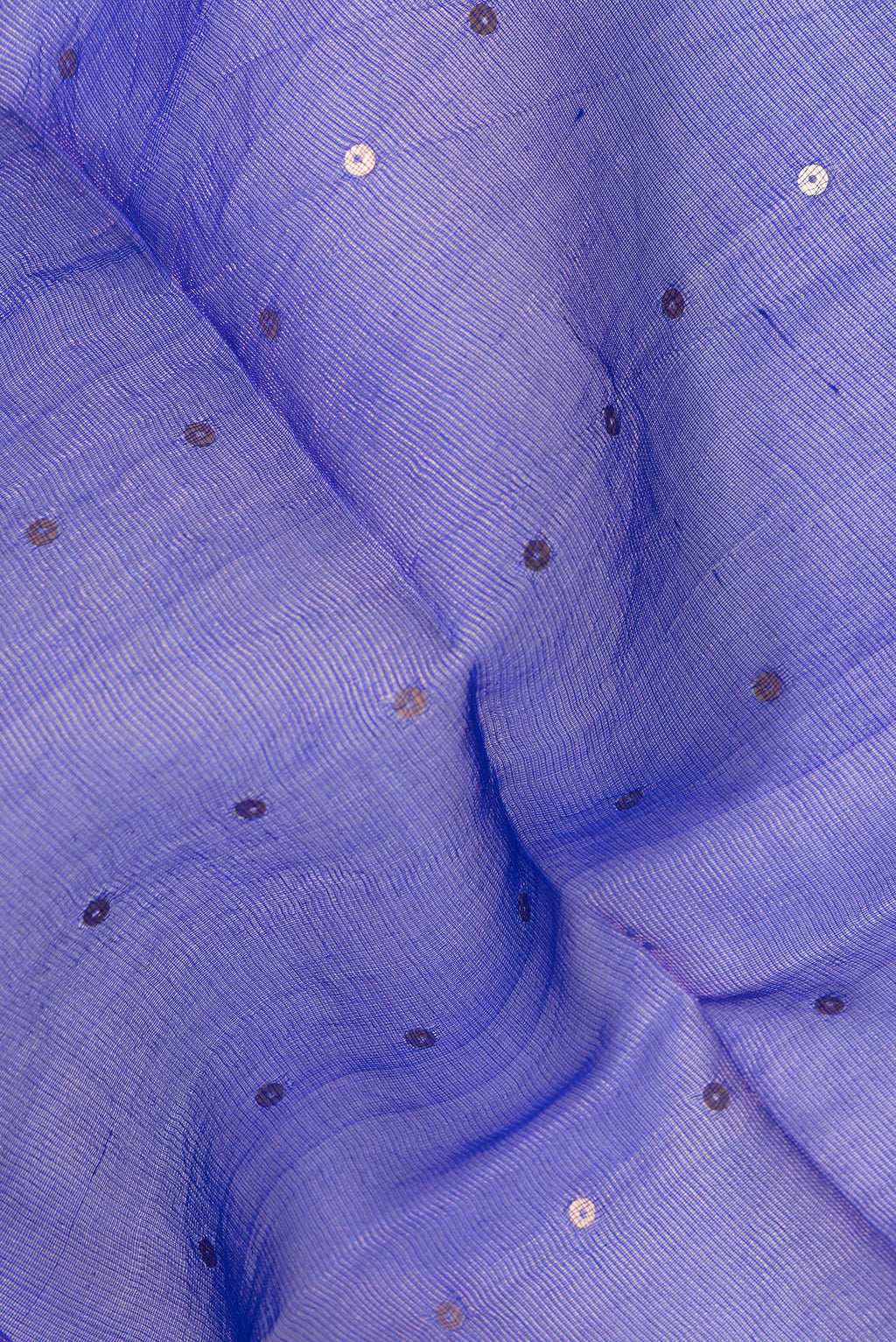 Close up of Pure Silk Royal Blue Tussar Saree with Embroidery on the body and Zari Border.  displaying folds