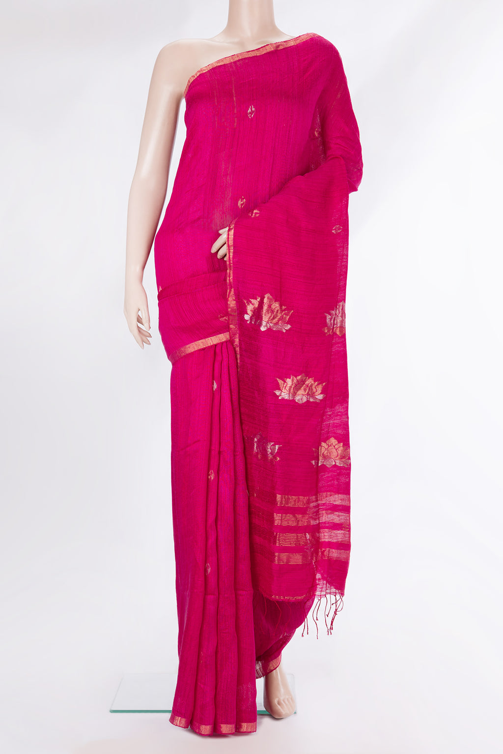 Pure Silk Pink Tussar Saree with Zari Butta on the body and Zari Border.  displayed on a mannequin