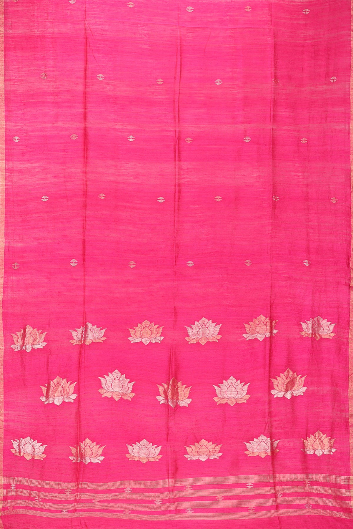 Flat view of Pure Silk Pink Tussar Saree with Zari Butta on the body and Zari Border. 