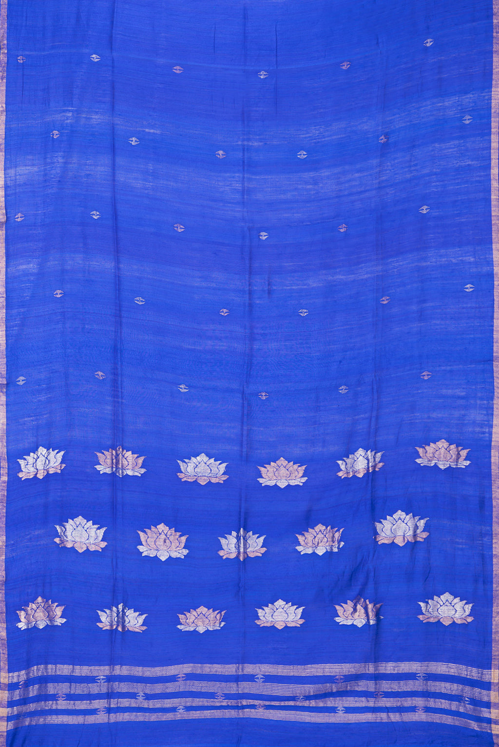 Flat view of Royal Blue Tussar Saree with Zari Butta on the body and Zari Border. 