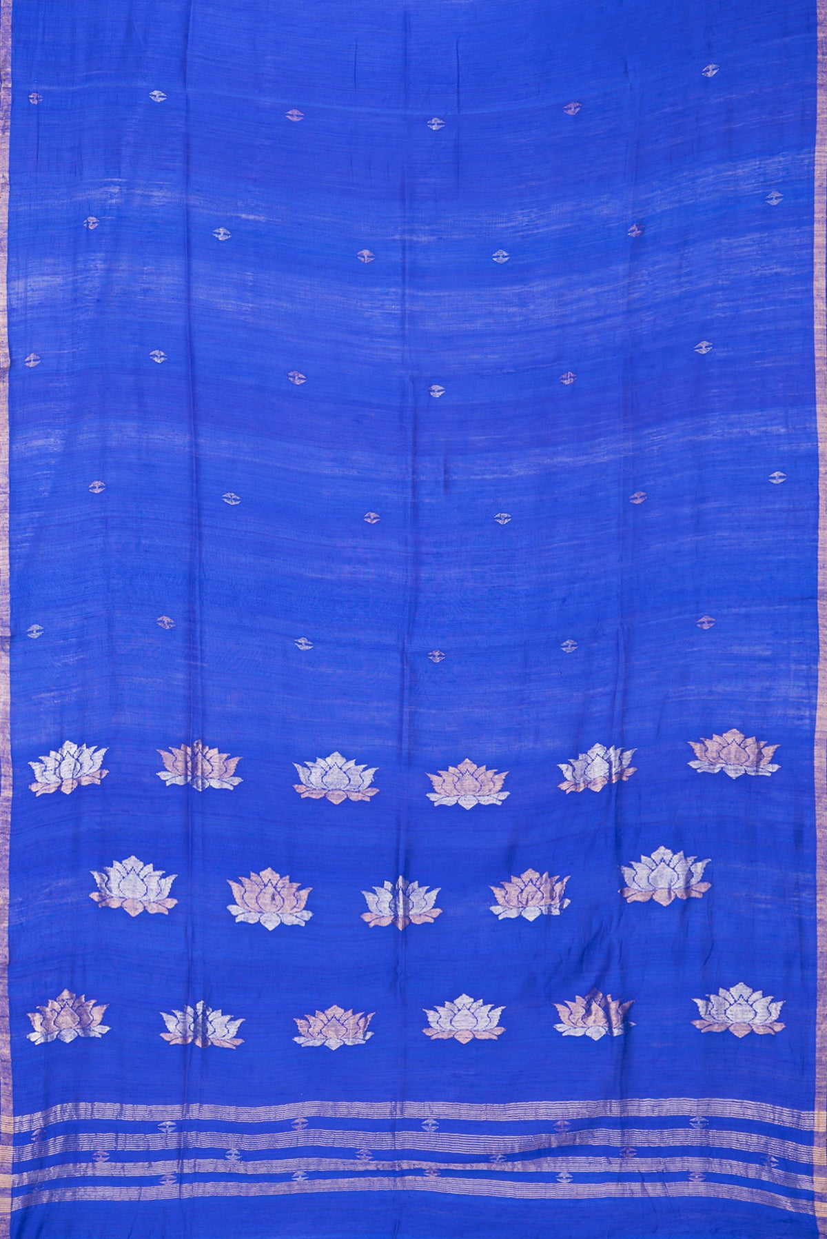 Flat view of Royal Blue Tussar Saree with Zari Butta on the body and Zari Border. 