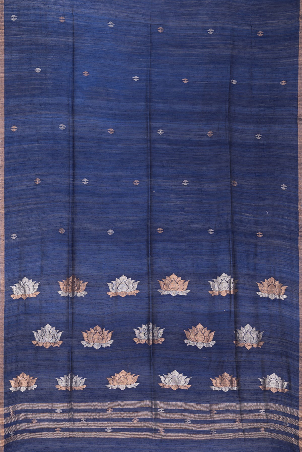 Flat view of Pure Silk Navy Blue Dual Tone Jute Saree with Zari Butta on the body and Zari Border. 