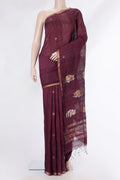 Pure Silk Brown Tussar Saree with Zari Butta on the body and Zari Border.  displayed on a mannequin