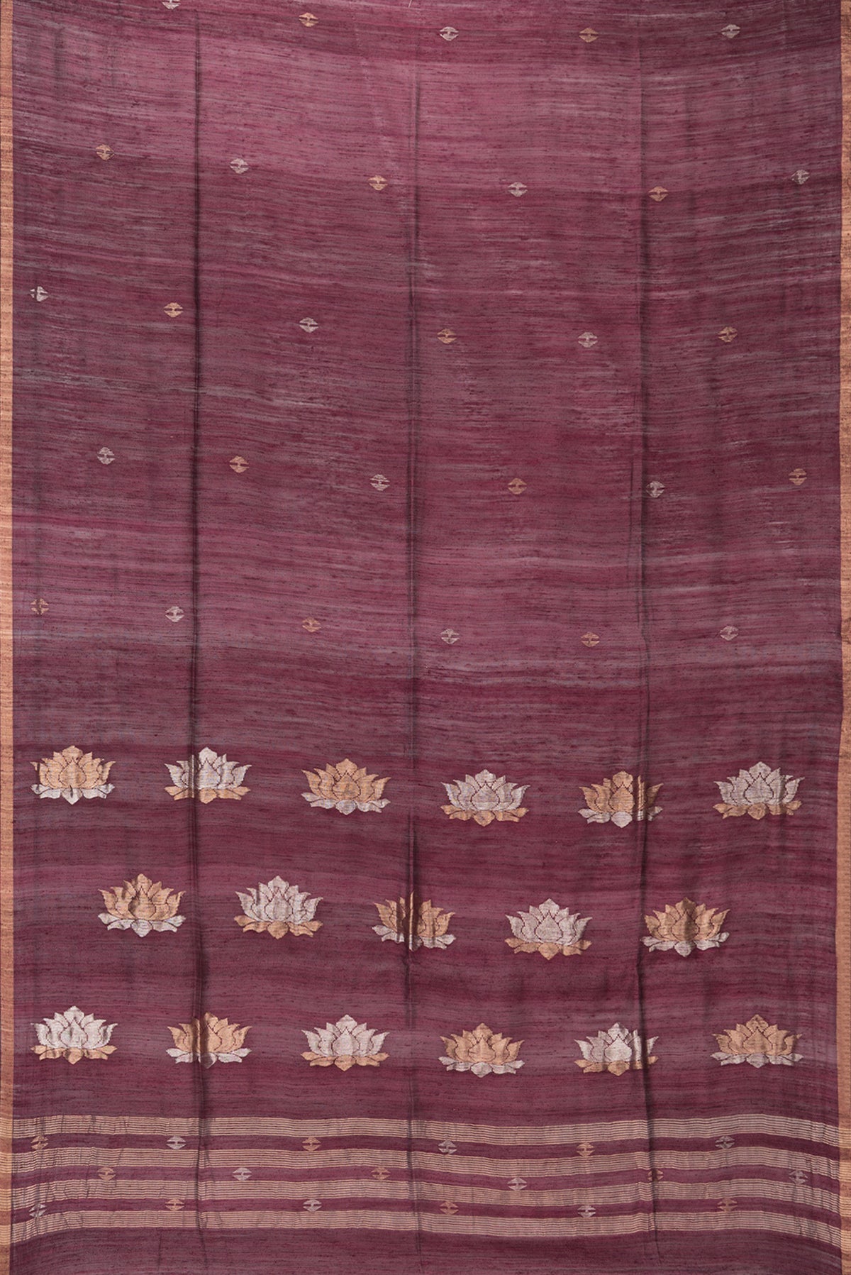 Flat view of Pure Silk Brown Tussar Saree with Zari Butta on the body and Zari Border. 