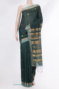 Pure Silk Green Dual Tone Jute Saree with Zari Butta on the body and Zari Border.  displayed on a mannequin