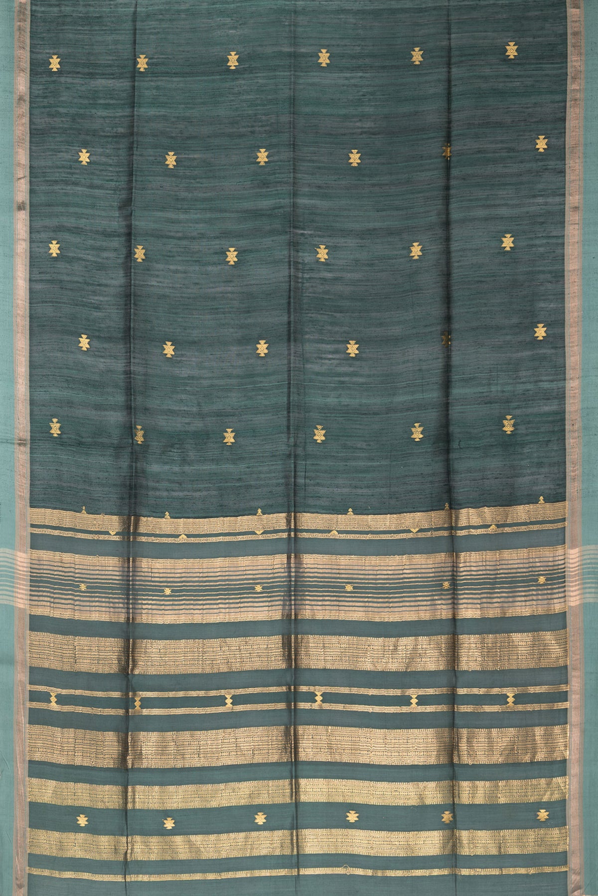 Flat view of Pure Silk Green Dual Tone Jute Saree with Zari Butta on the body and Zari Border. 