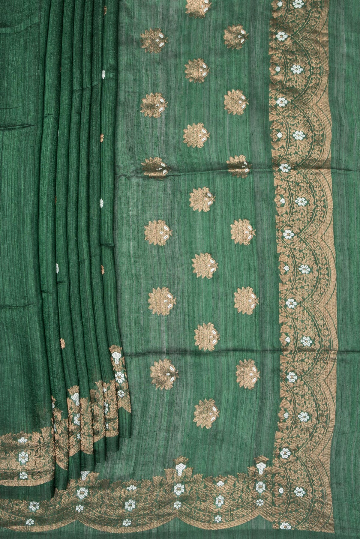 Pleats and pallu of Green Tussar Saree with Zari Butta on the body and Fancy Border. 