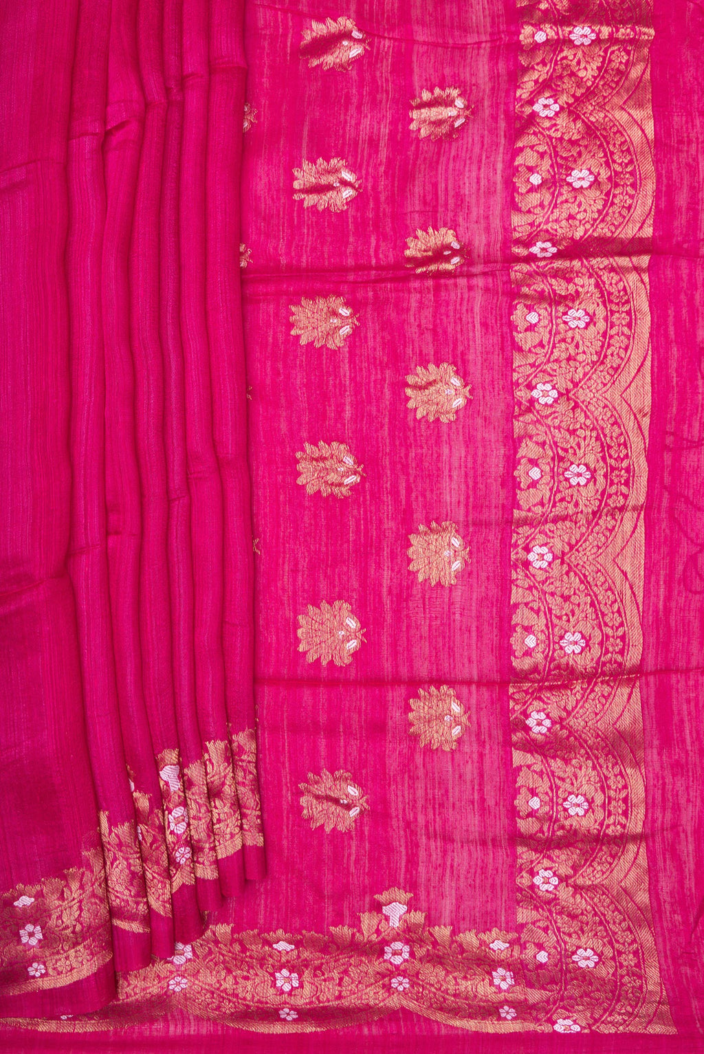 Pleats and pallu of Pure Silk Pink Tussar Saree with Zari Butta on the body and Zari Border. 
