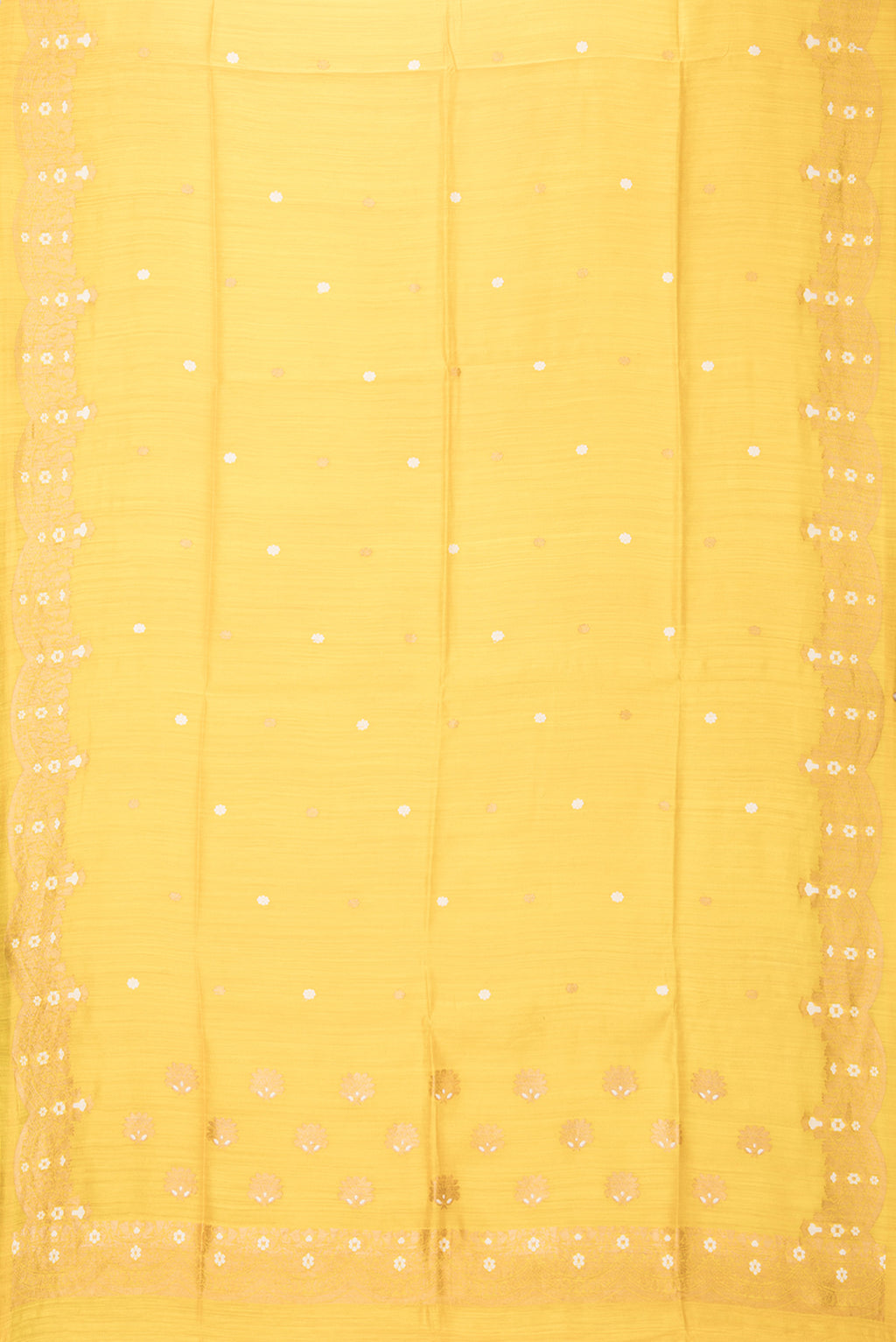 Flat view of Pure Silk Lemon Yellow Tussar Saree with Zari Butta on the body and Fancy Border. 