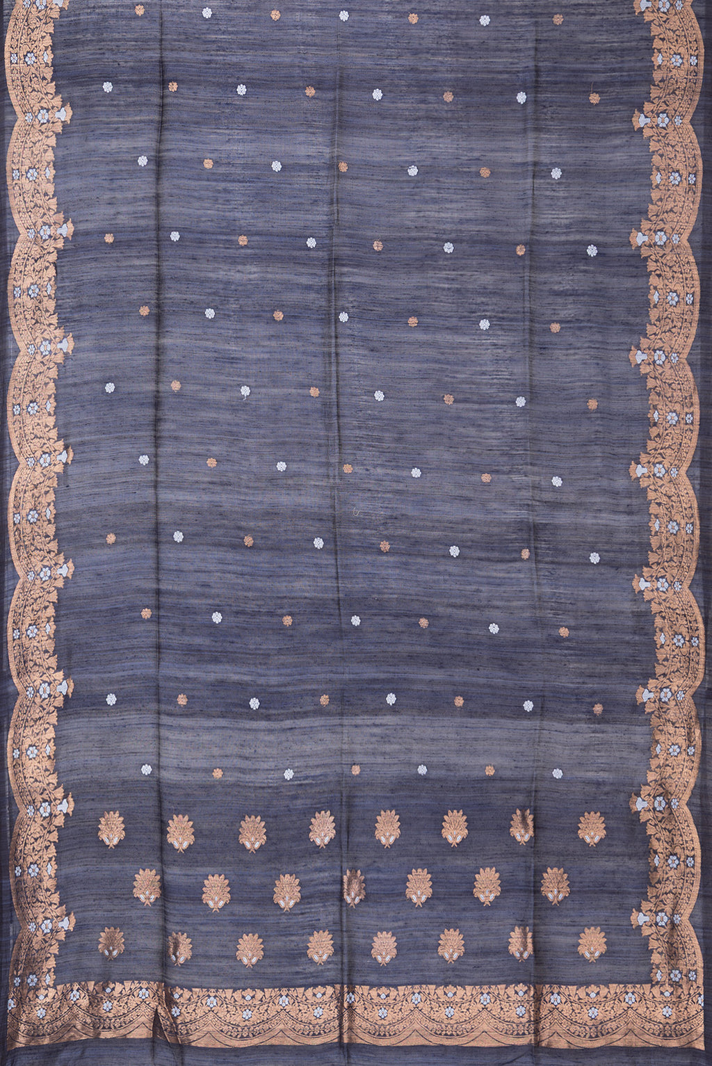 Flat view of Navy Blue Tussar Saree with Zari Butta on the body and Fancy Border. 