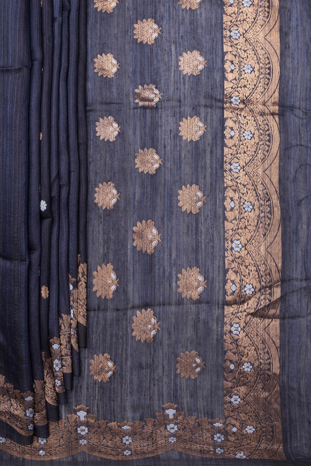 Pleats and pallu of Navy Blue Tussar Saree with Zari Butta on the body and Fancy Border. 