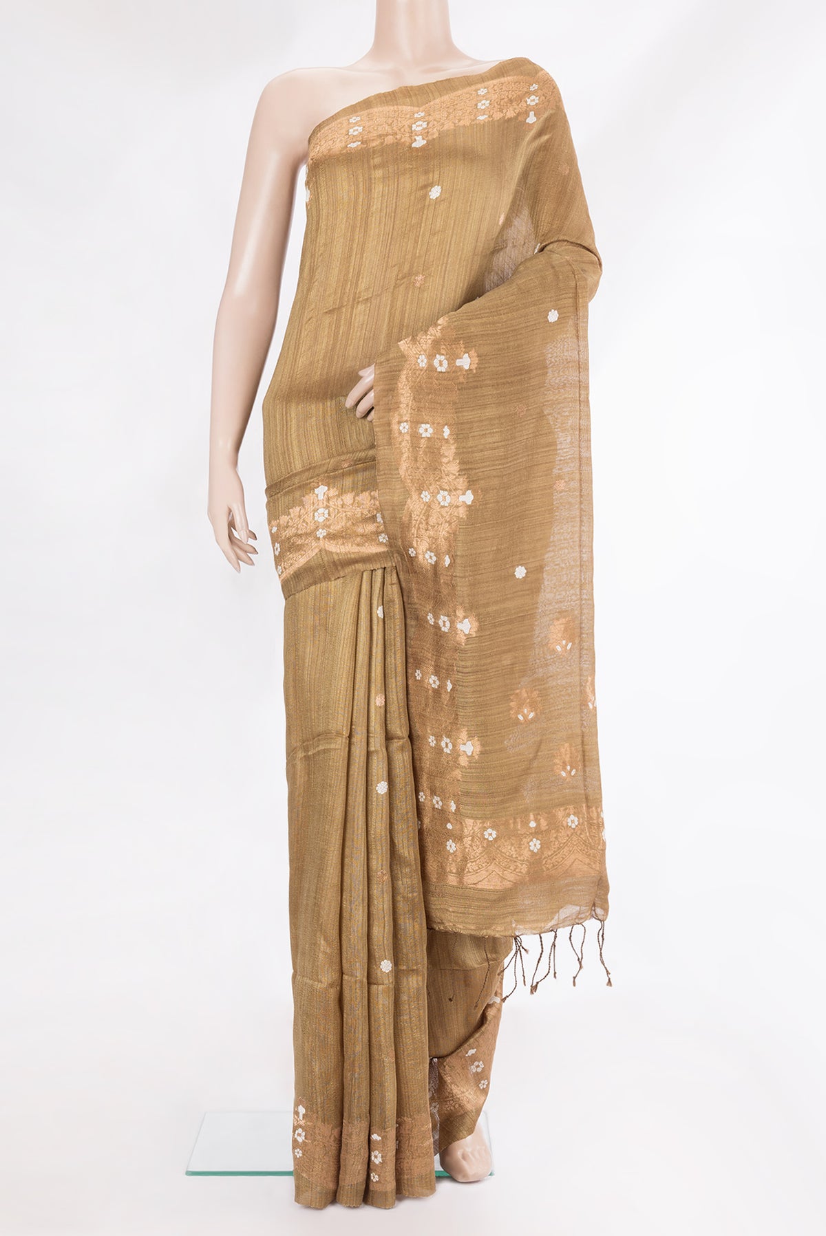 Pure Silk Gold Dual Tone Jute Saree with Zari Butta on the body and Fancy Border.  displayed on a mannequin