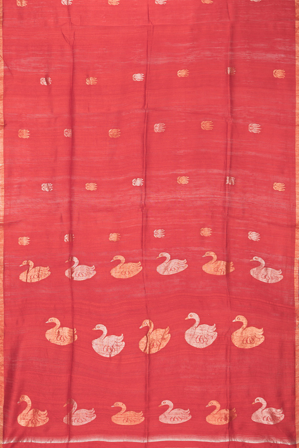 Flat view of Red Tussar Saree with Zari Butta on the body and Zari Border. 