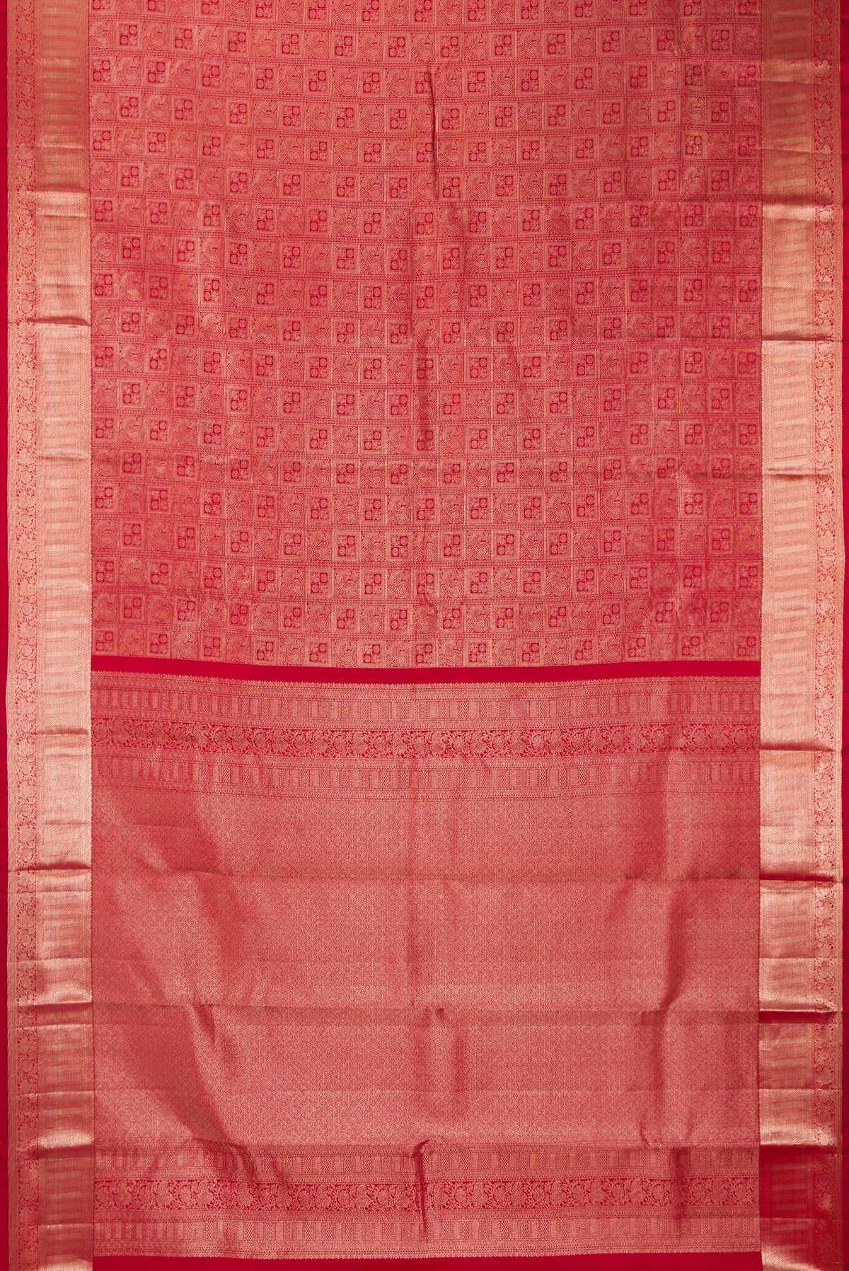 Flat view of Pure Silk Red Kanchipuram Saree with Zari Brocade on the body and Zari Border. 