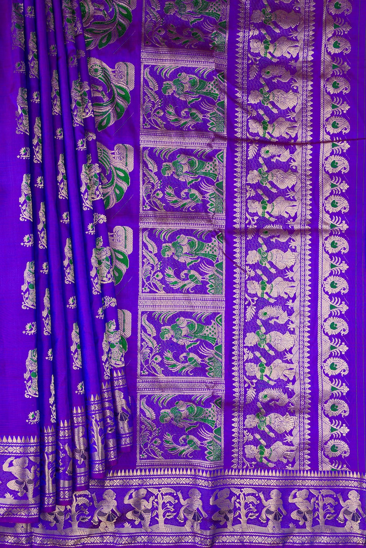 Pleats and pallu of Pure Silk Purple Dual Tone Baluchari Saree with Zari And Thread Butta on the body and Fancy Border. 