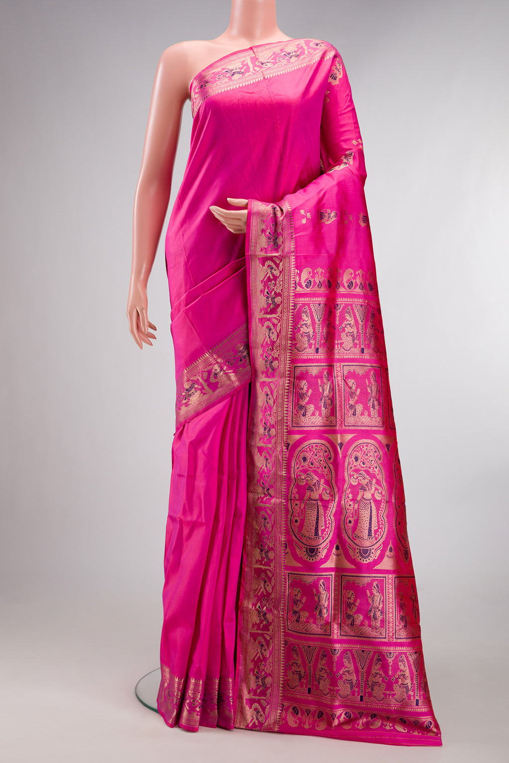 Pure Silk Pink Baluchari Saree with Zari And Thread Butta on the body and Fancy Border.  displayed on a mannequin