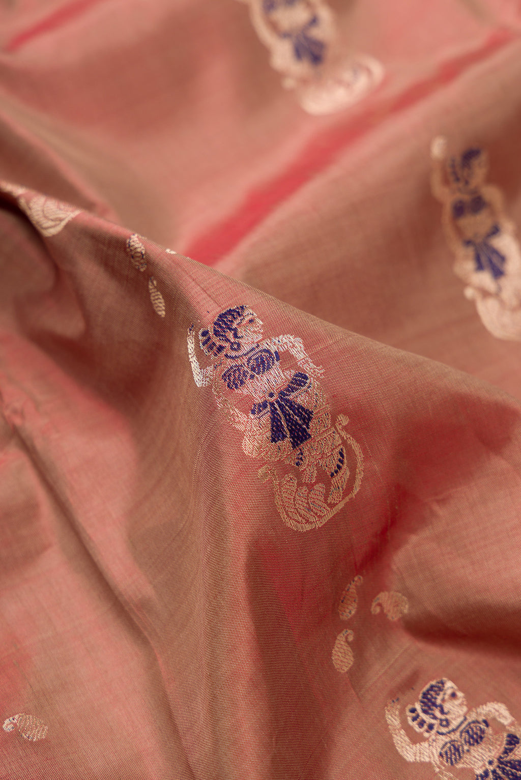 Close up of Pure Silk Brown Dual Tone Baluchari Saree with Zari And Thread Butta on the body and Fancy Border.  displaying folds
