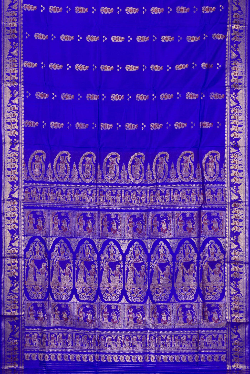 Flat view of Pure Silk Royal Blue Baluchari Saree with Zari And Thread Butta on the body and Fancy Border. 