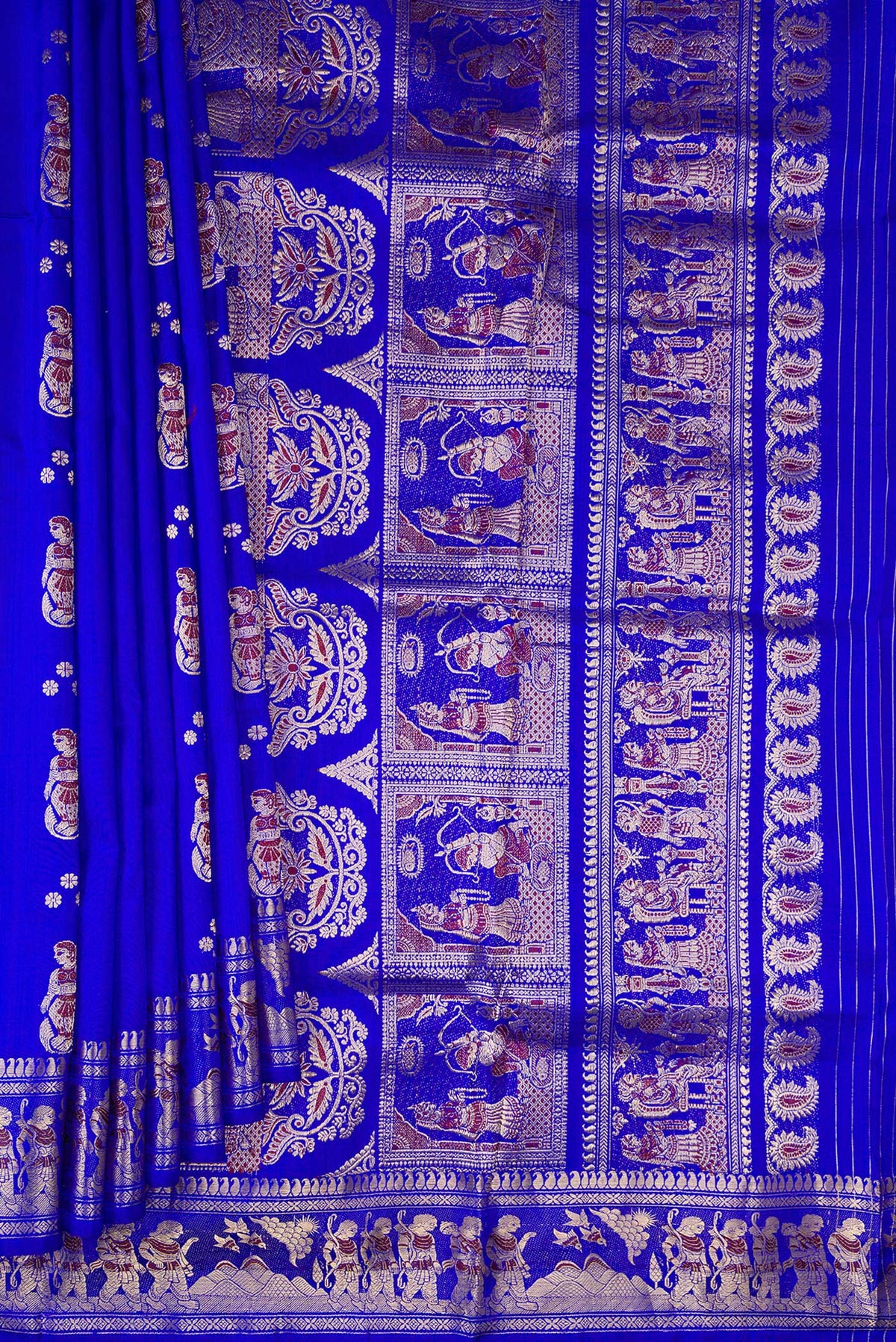 Pleats and pallu of Pure Silk Royal Blue Baluchari Saree with Zari And Thread Butta on the body and Fancy Border. 