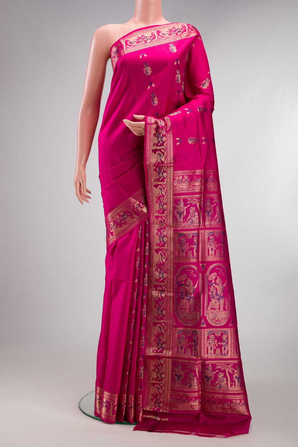 Pure Silk Pink Baluchari Saree with Zari And Thread Butta on the body and Fancy Border.  displayed on a mannequin