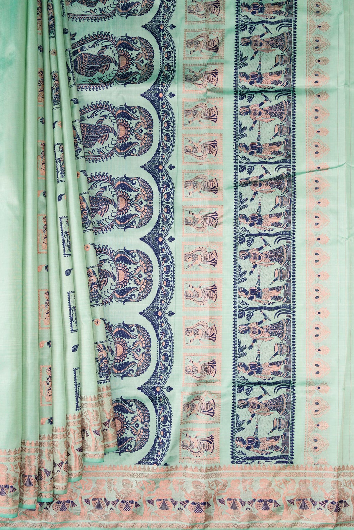 Pleats and pallu of Pure Silk Pista Green Baluchari Saree with Zari And Thread Butta on the body and Fancy Border. 