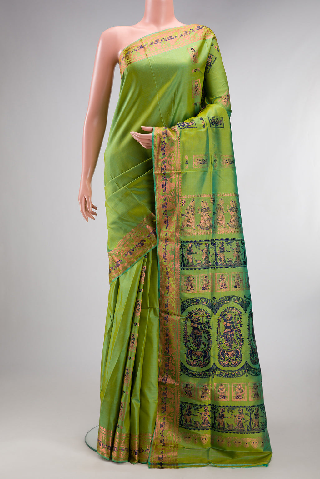 Pure Silk Parrot Green Dual Tone Baluchari Saree with Zari And Thread Butta on the body and Fancy Border.  displayed on a mannequin