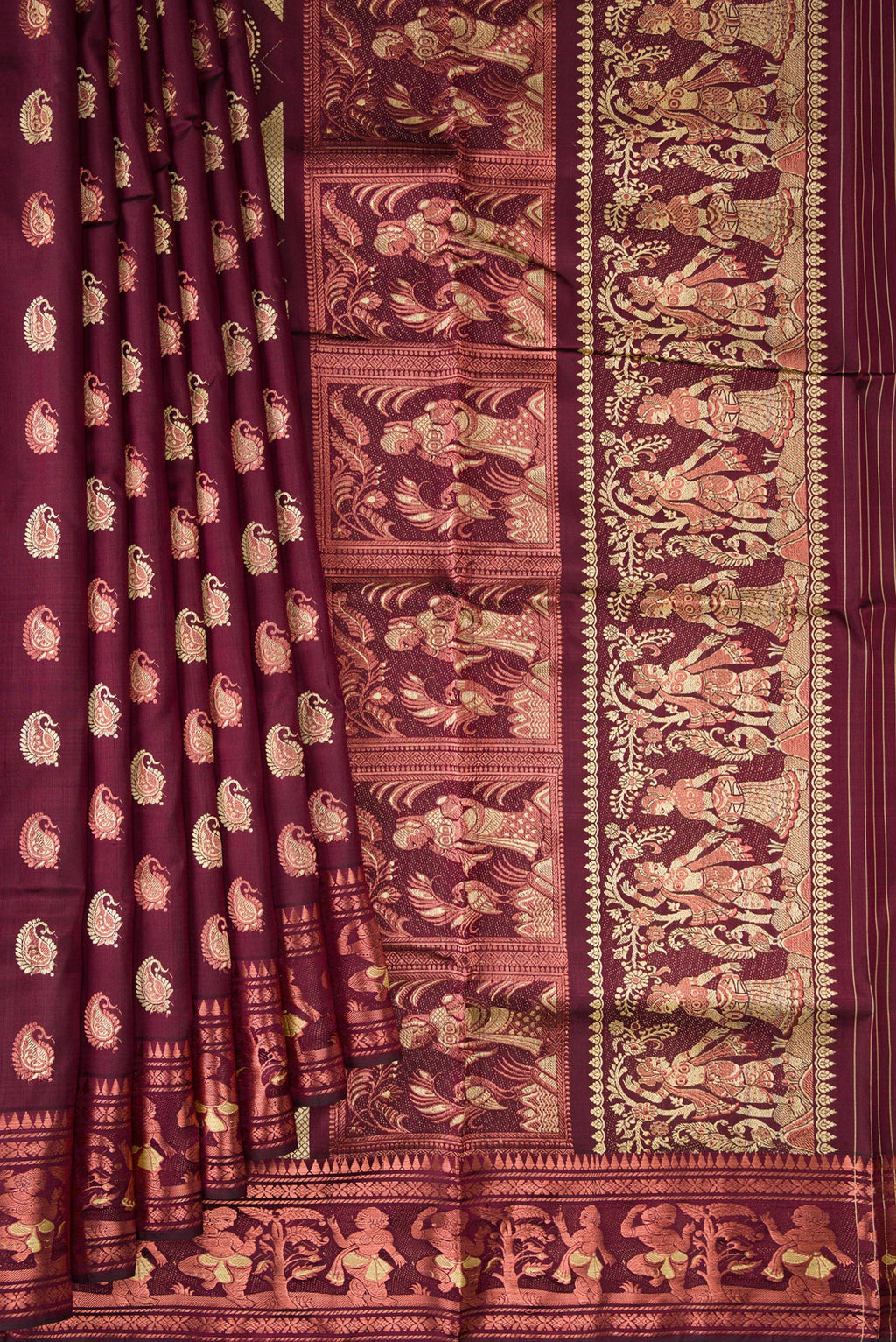 Pleats and pallu of Pure Silk Coffee Brown Baluchari Saree with Zari And Thread Butta on the body and Zari And Thread Border. 