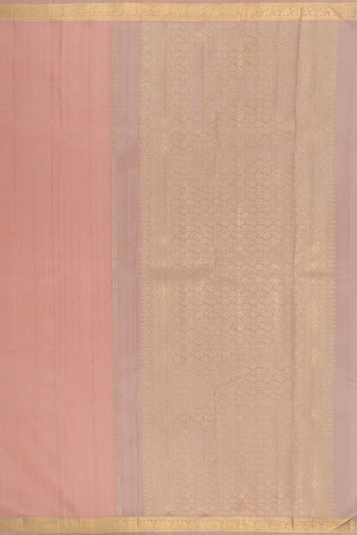 Close up image of the pallu of Pure Silk Rose Gold Kanchipuram Saree with Jacquard design on the body and Zari Border. 