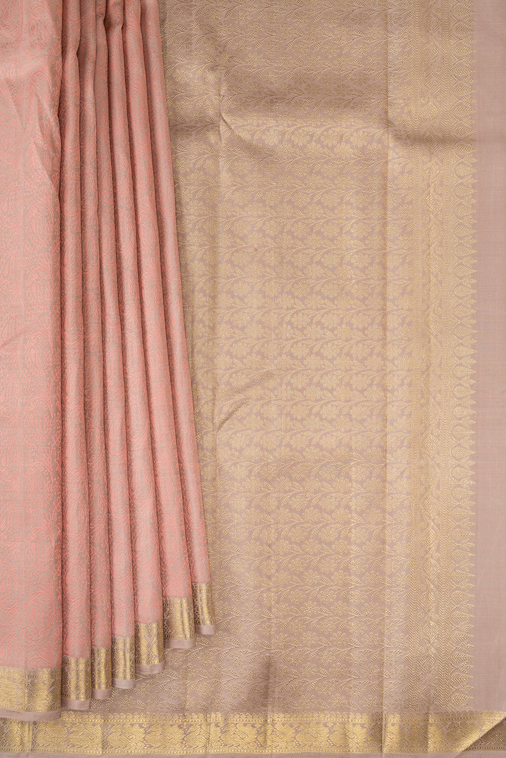 Pleats and pallu of Pure Silk Rose Gold Kanchipuram Saree with Jacquard design on the body and Zari Border. 