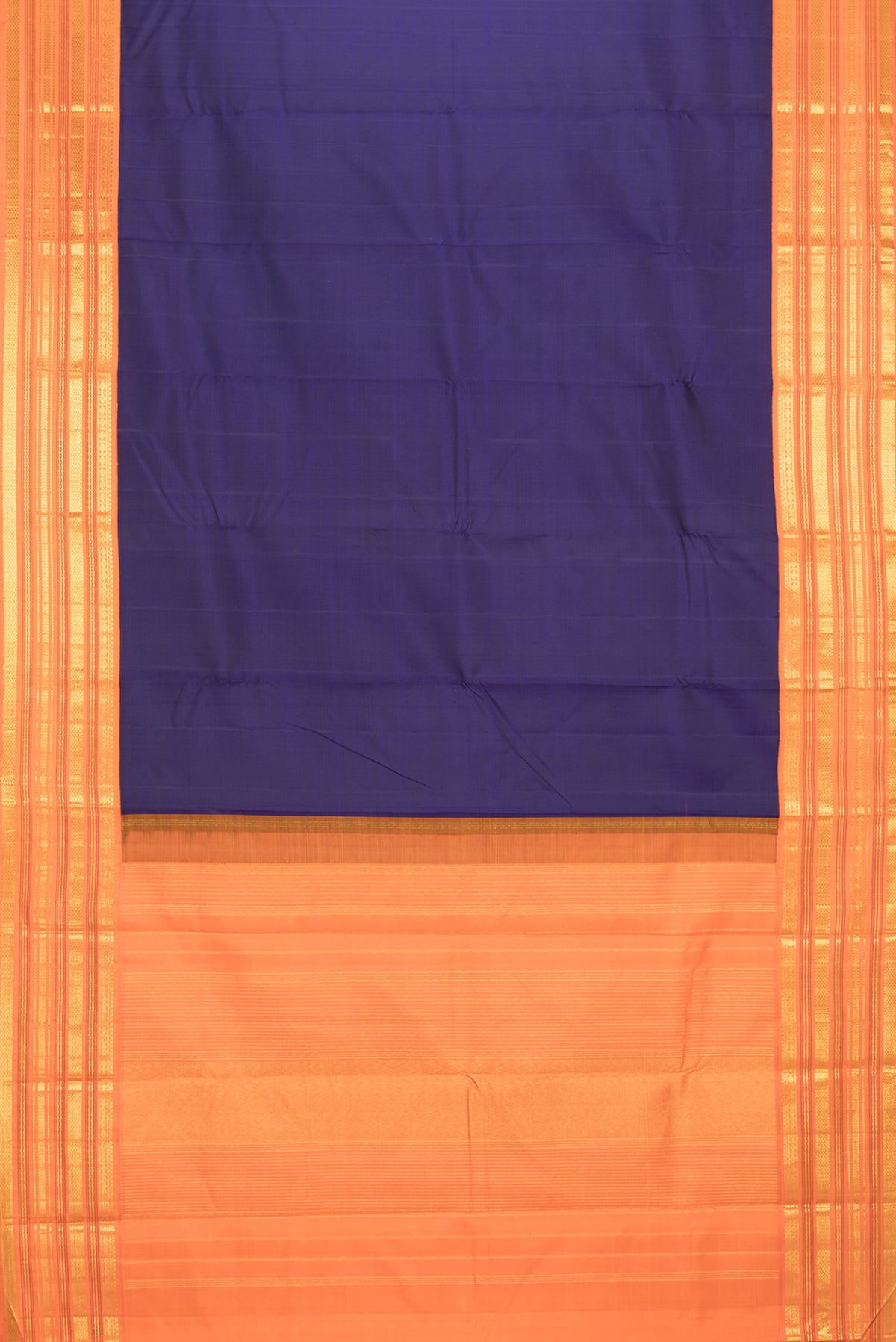 Flat view of Pure Silk Navy Blue Dual Tone Kanjivaram Saree with Plain Body and Zari Border. 