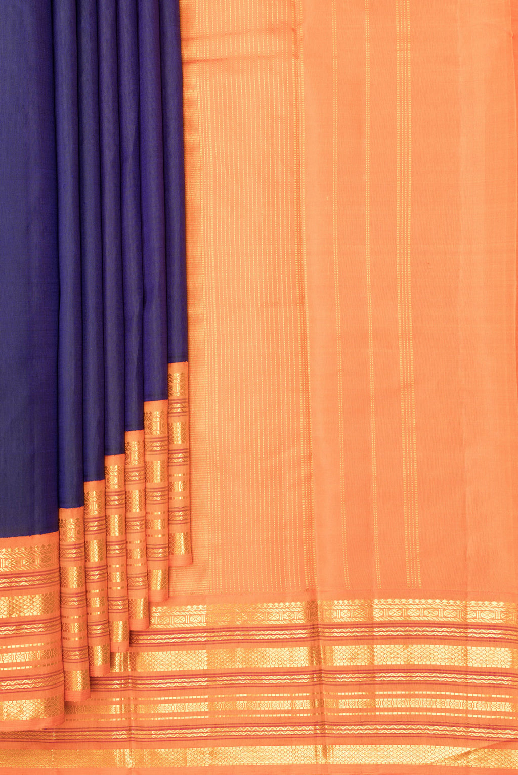 Pleats and pallu of Pure Silk Navy Blue Dual Tone Kanjivaram Saree with Plain Body and Zari Border. 