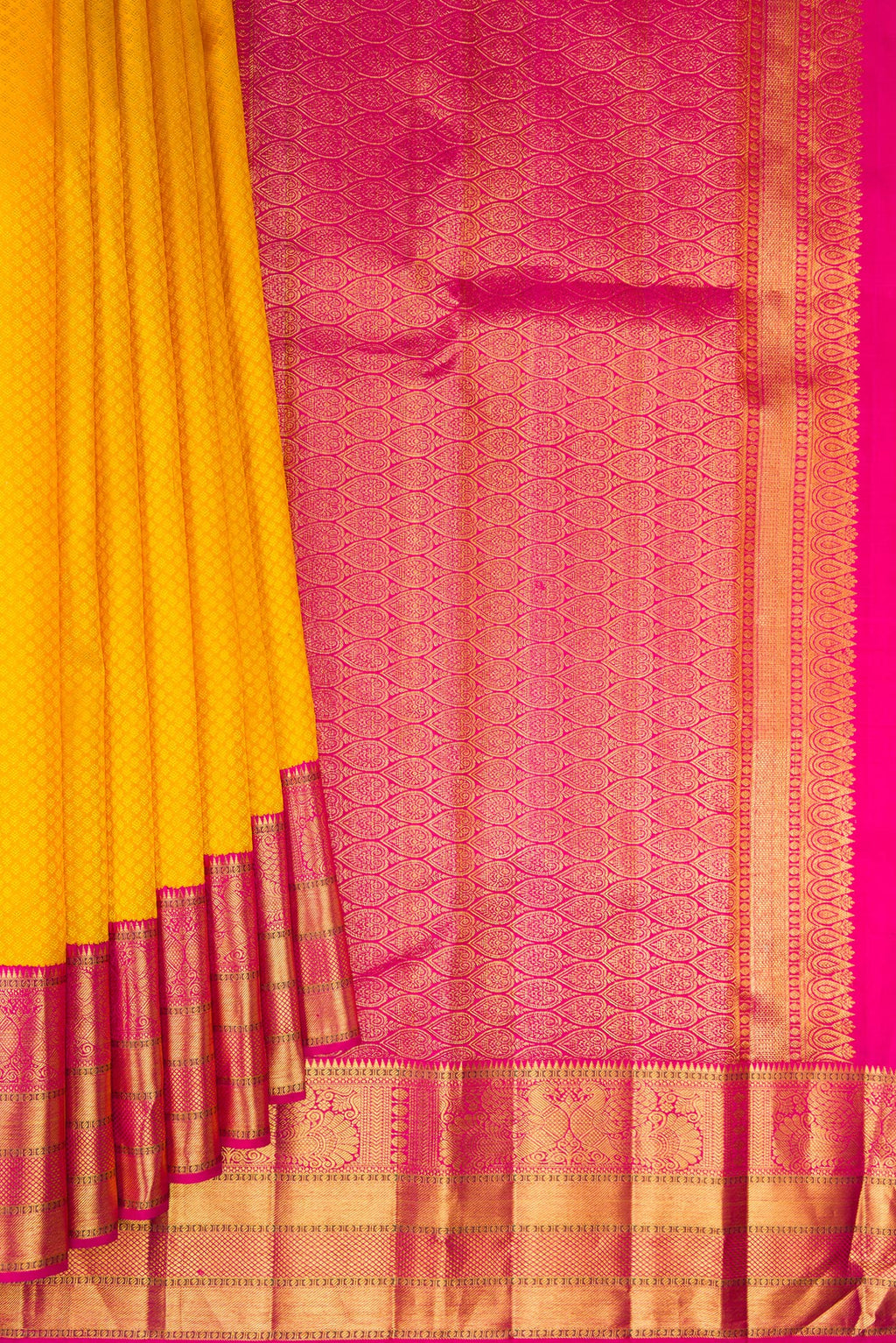 Pleats and pallu of Pure Silk Yellow Kanjivaram Saree with Jacquard design on the body and Zari Border. 