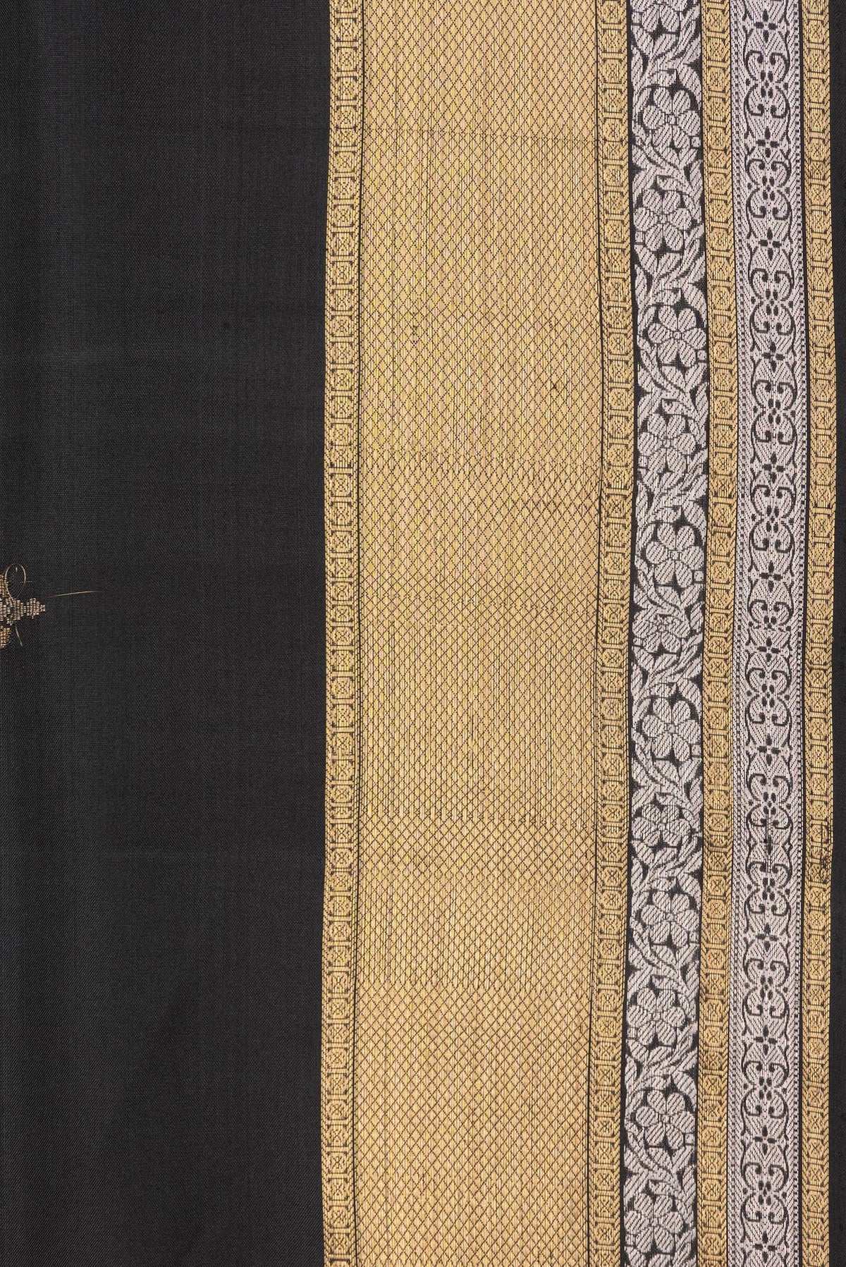 Border image of Pure Silk Black Dual Tone Soft Saree with Zari Butta on the body and Zari Border. 
