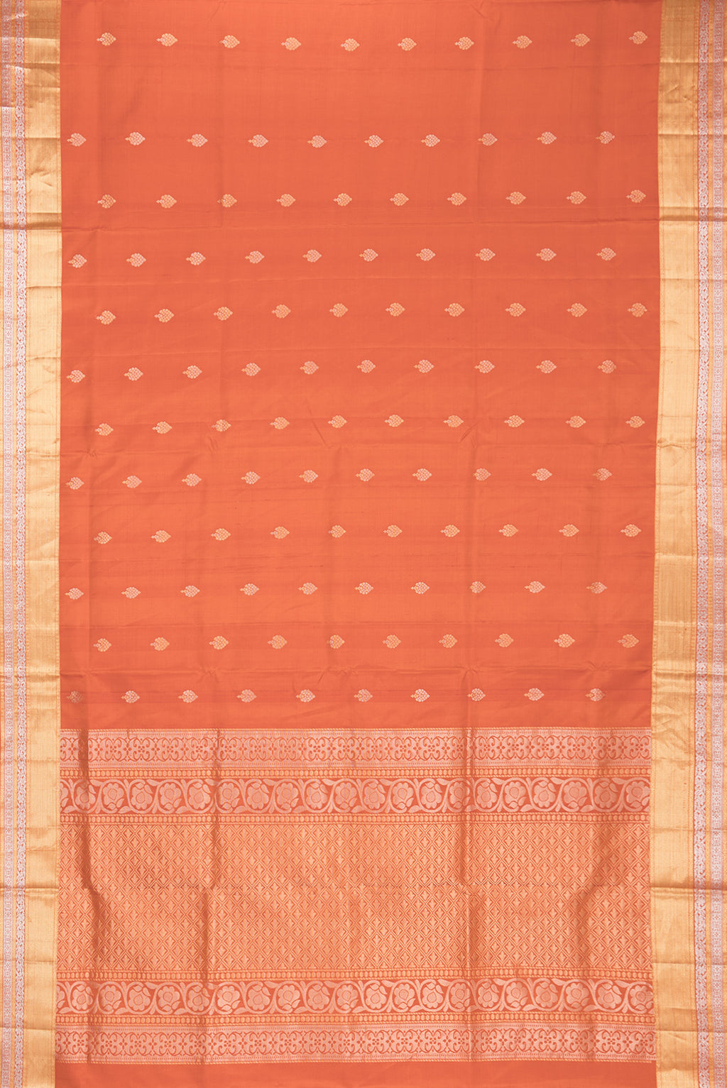 Flat view of Pure Silk Rust Dual Tone Soft Saree with Zari Butta on the body and Zari Border. 