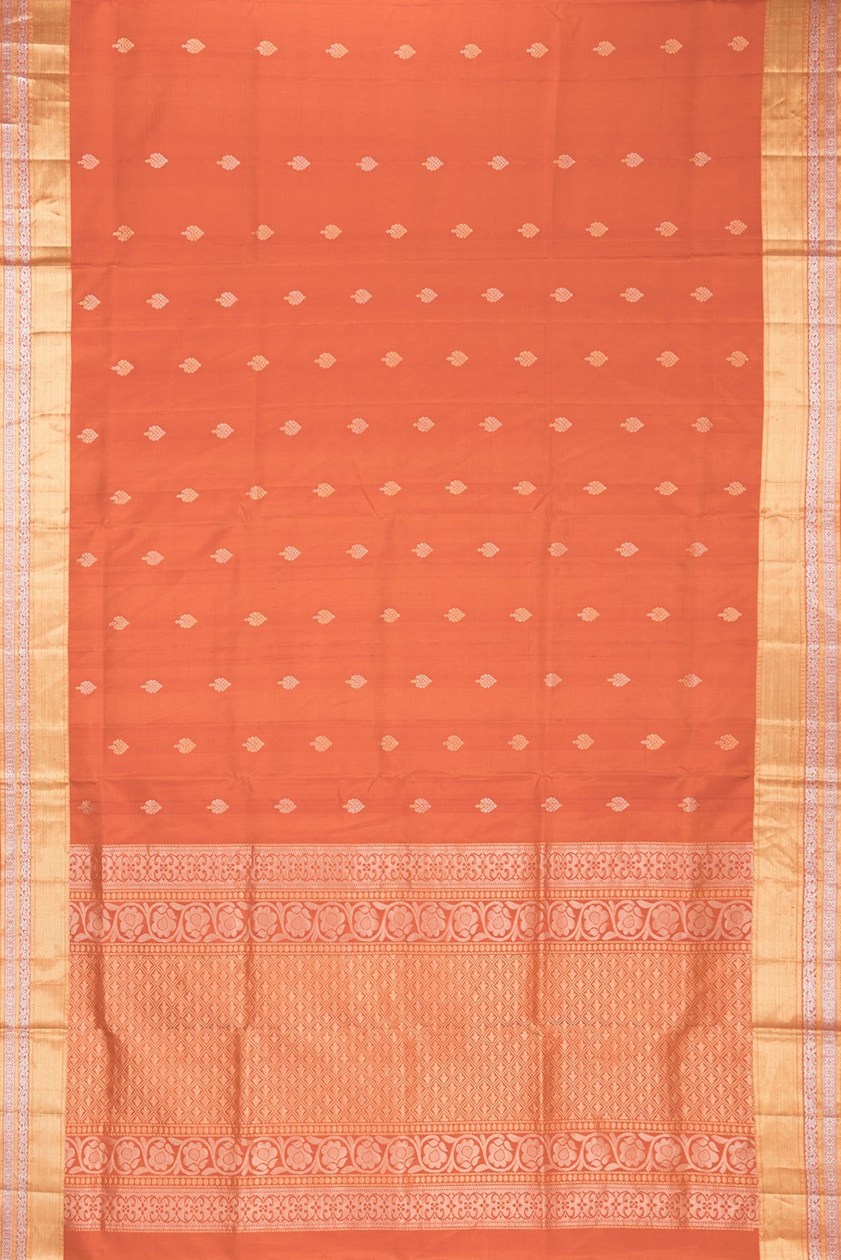 Flat view of Pure Silk Rust Dual Tone Soft Saree with Zari Butta on the body and Zari Border. 