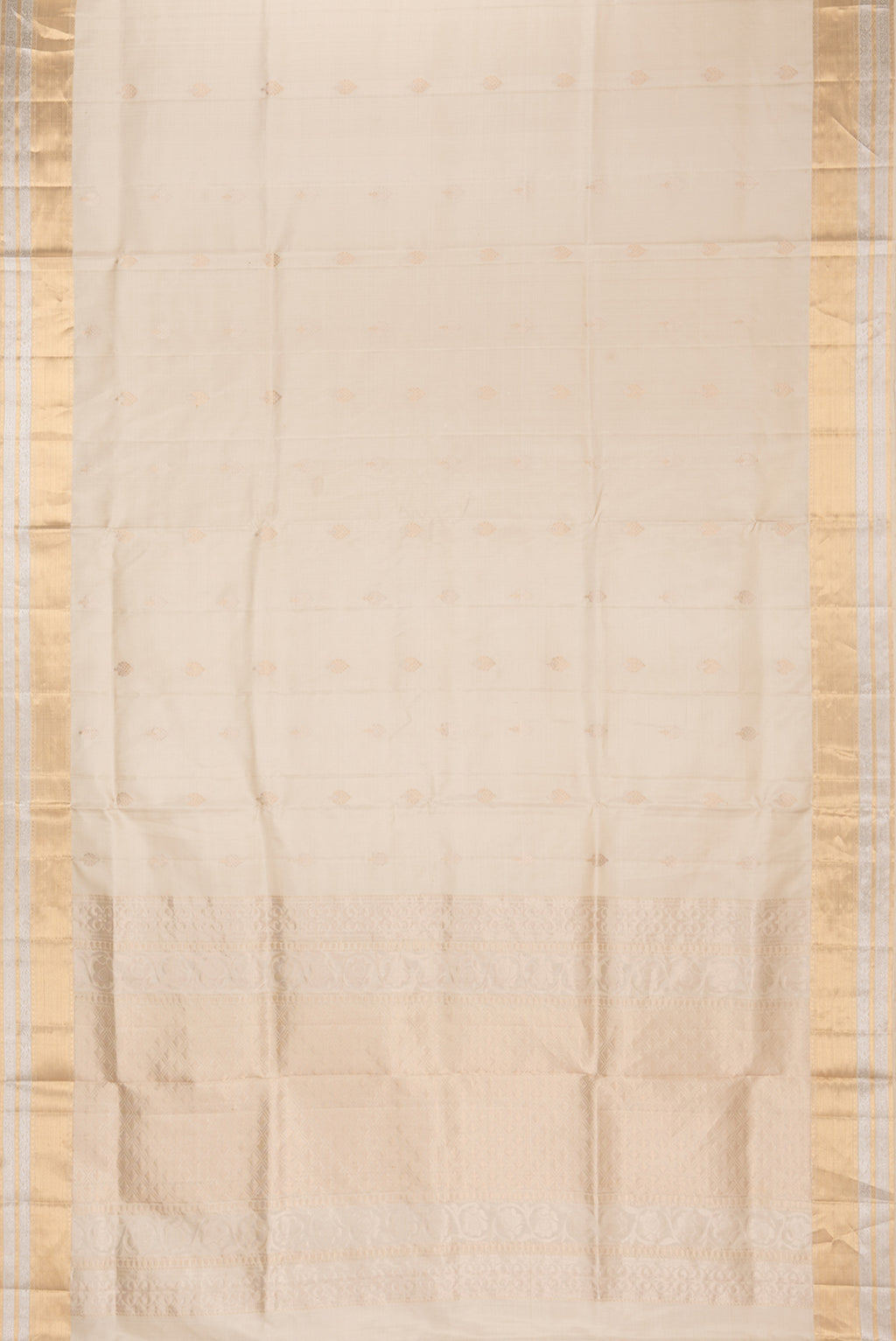 Flat view of Pure Silk Beige Dual Tone Soft Saree with Zari Butta on the body and Zari Border. 