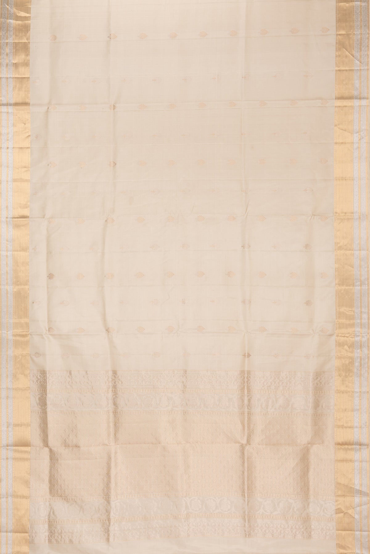 Flat view of Pure Silk Beige Dual Tone Soft Saree with Zari Butta on the body and Zari Border. 