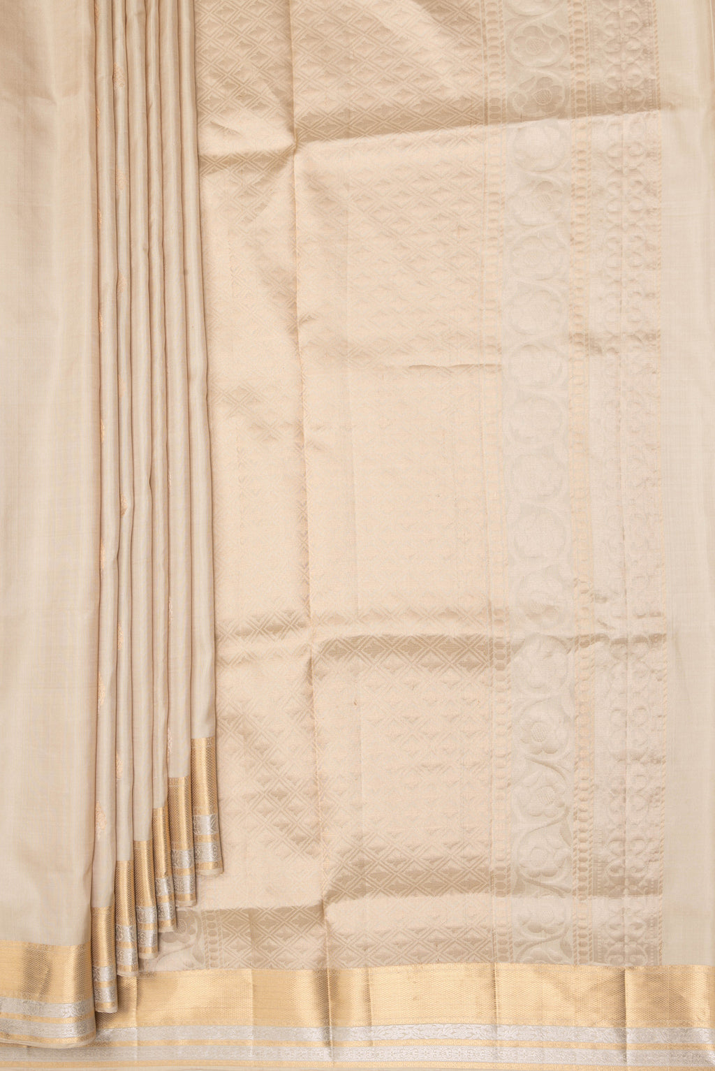 Pleats and pallu of Pure Silk Beige Dual Tone Soft Saree with Zari Butta on the body and Zari Border. 