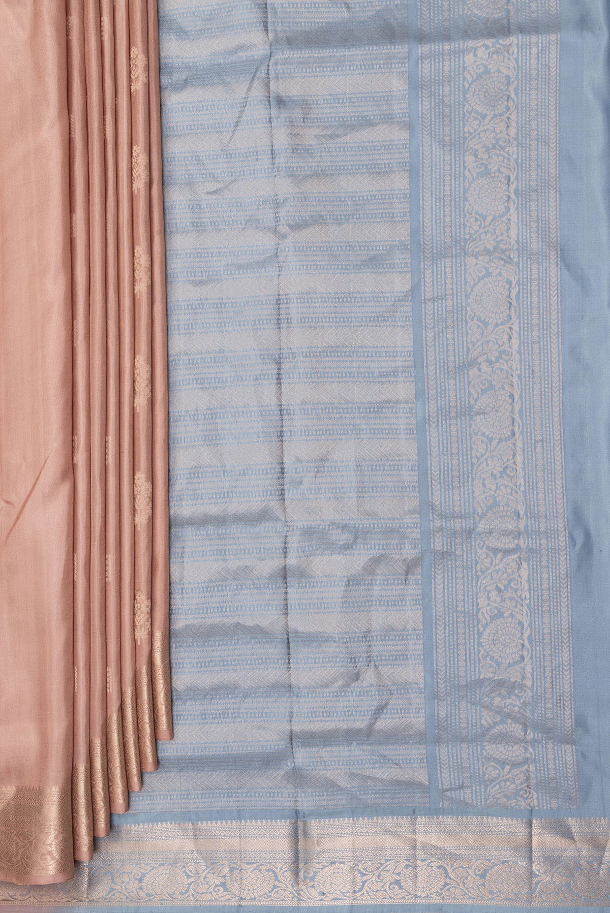 Pleats and pallu of Pure Silk Rose Gold Dual Tone Soft Saree with Zari Butta on the body and Zari Border. 