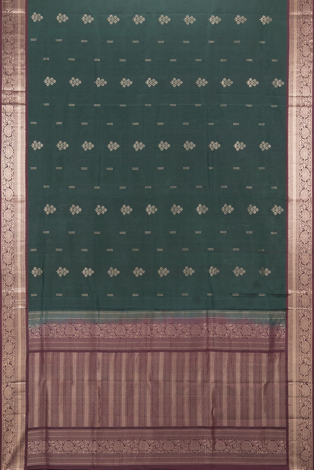Flat view of Pure Silk Bottle Green Soft Saree with Zari Butta on the body and Zari Border. 