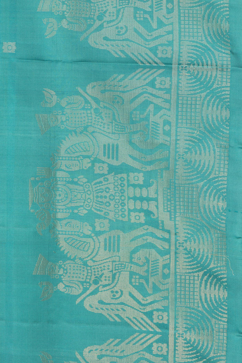 Border image of Pure Silk Peacock Blue Dual Tone Soft Saree with Zari Butta on the body and Fancy Border. 